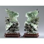Pair of carved jadeite flying eagles.