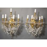 Pair of Louis XIV style crystal and ormolu sconces