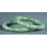 Pair of jadeite dragon bracelets, 19th c.