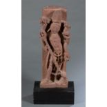 Red sandstone Hindu sculpture.