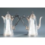 2 English sterling silver coffee and tea pots.