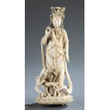 Ivory okimono of a Guanyin with dragon