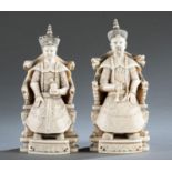 Pair of ivory okimono of Chinese lord couple.