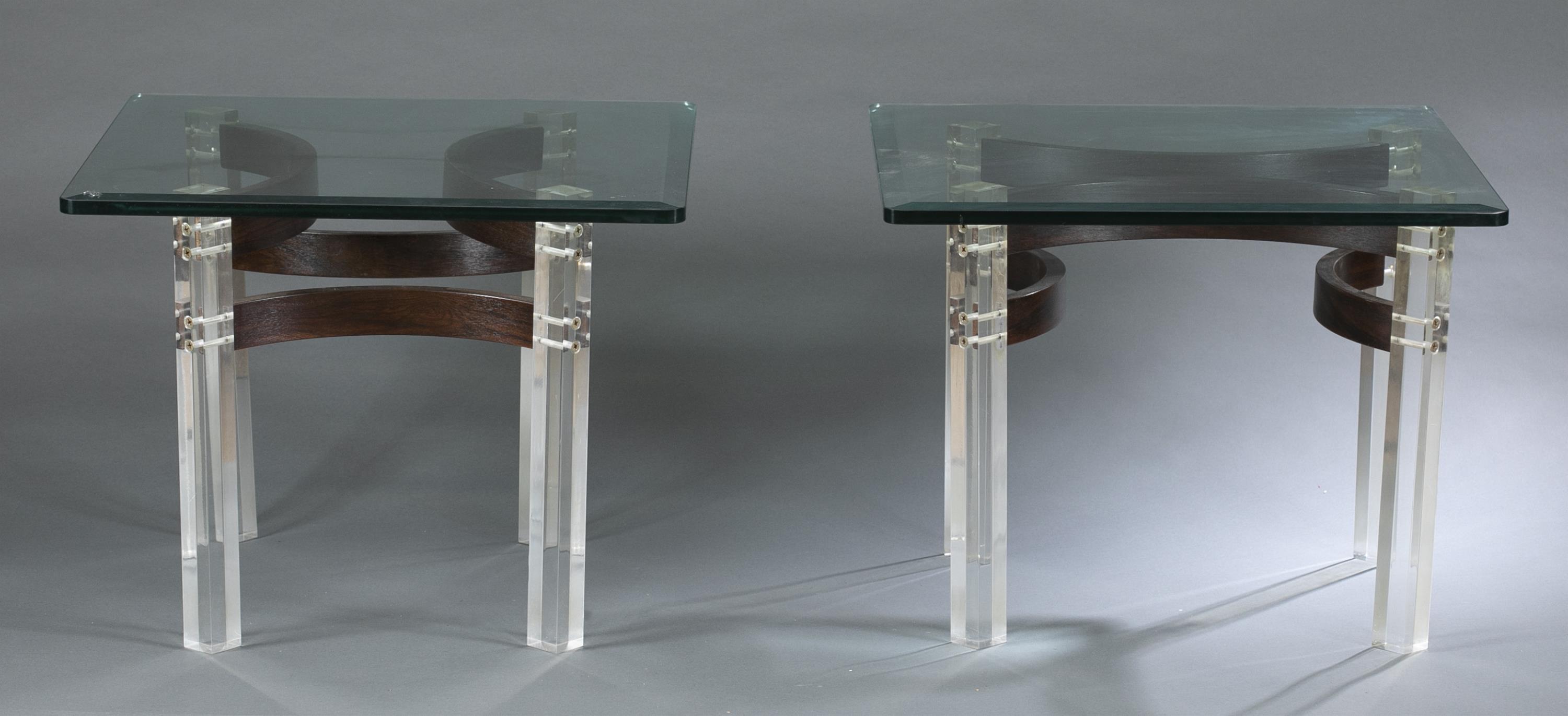 Pair of rosewood and Lucite coffee tables.