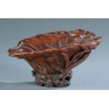 Fine carved rhino horn libation cup.