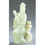 Carved light green jade Chinese woman holding lute