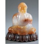 Japanese carved agate Buddha on wood stand