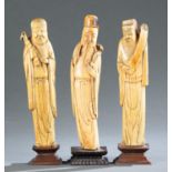 Three Chinese ivory carvings of old men, 19th c.