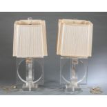Pair of Modernist Lucite acrylic lamps.