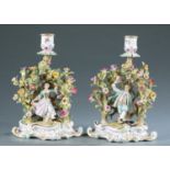 2 Meissen porcelain figural candlesticks.