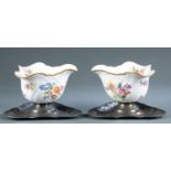 Pair of porcelain footed bowls with sterling bases