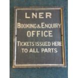 An early LNER booking office enquiry sign, signwritten on black board with moulded pine frame. (32in