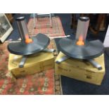 A pair of boxed & unused Discus T steps, with ribbed adjustable rounded platforms on columns with