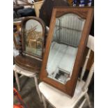 A Victorian mahogany dressing table mirror with arched framed plate on barleytwist columns, the D