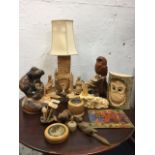 A collection of carved wood - some signed pieces - birds, animals, turned, yew, a tablelamp fireside