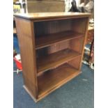 An Edwardian mahogany open bookcase by Old Times Furnishing, with three deep adjustable shelves to