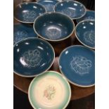 A Susie Cooper dessert set decorated with leaf & berries on blue ground - bowl, four comports and