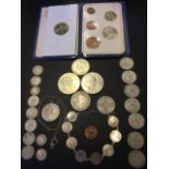 A collection of coins including Victorian silver sixpence, threepenny bits, a decimal proof set, a