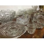 A quantity of glass including jelly moulds, comports, a pair of vases, pressed glass, a pair of