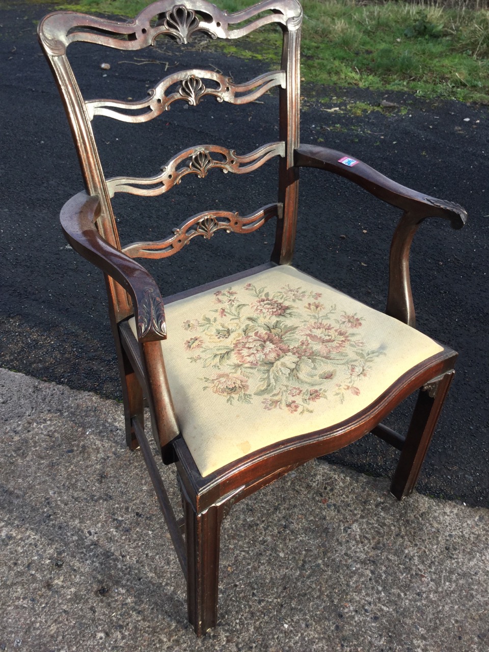 A mahogany ladderback elbow chair with four pierced anthemion carved rails, the shaped arms with - Image 2 of 3