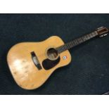 An Aria twelve string guitar, the Japanese made instrument with complete strings, cedar front and