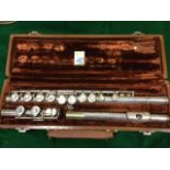 A cased silver plated flute by WT Armstrong, the instrument numbered 104M8543. (27.25in)