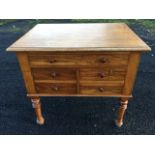 A nineteenth century walnut cabinet with moulded top above a long knobbed drawer, and two small