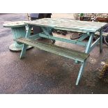 A painted garden table & bench set with slatted rectangular top above two plank seats on angled