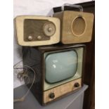 A wood framed 60s television, the screen behind glass with speaker below; a Pye walnut cased valve