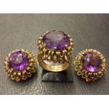 A late Victorian amethysts ring & ear set, the circular cut stones in gold wirework twin looped
