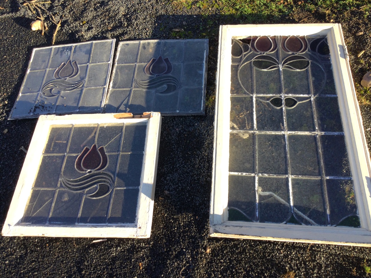 A set of three leaded stained glass windows with central red tulip design; and another similar in - Image 3 of 3