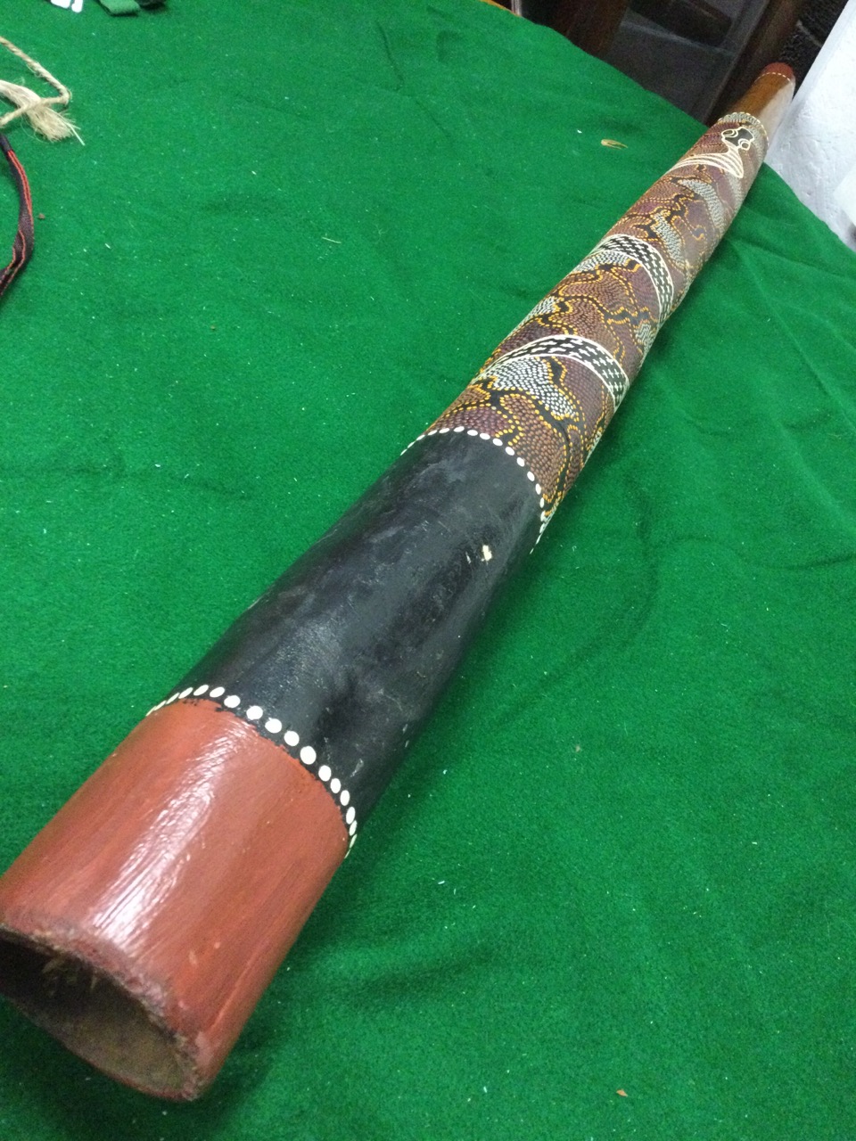 A tapering Indonesian Aboriginal didgeridoo, with painted and enamelled decoration of snake to body; - Image 3 of 3
