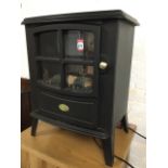 A Dimplex electric stove with faux coals above a fan heater, raised on angled feet. (16.75in x 12.