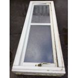 A new bespoke made double glazed casement window. (21in x 61in)