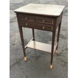 A small stained side table, the rectangular rounded top above two short and one long cockbeaded