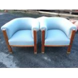 A pair of Empire walnut armchairs with contemporary grey baize upholstery, the rounded horseshoe