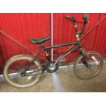 A Nottingham made 1970s Raleigh Burner Mach 2 bicycle, with wide tyres, long seat, oval frame and