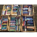 Six boxes of paperback books - contemporary novels, fiction, academic philosophy, religion,