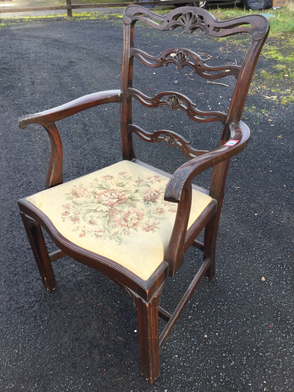 A mahogany ladderback elbow chair with four pierced anthemion carved rails, the shaped arms with - Image 3 of 3