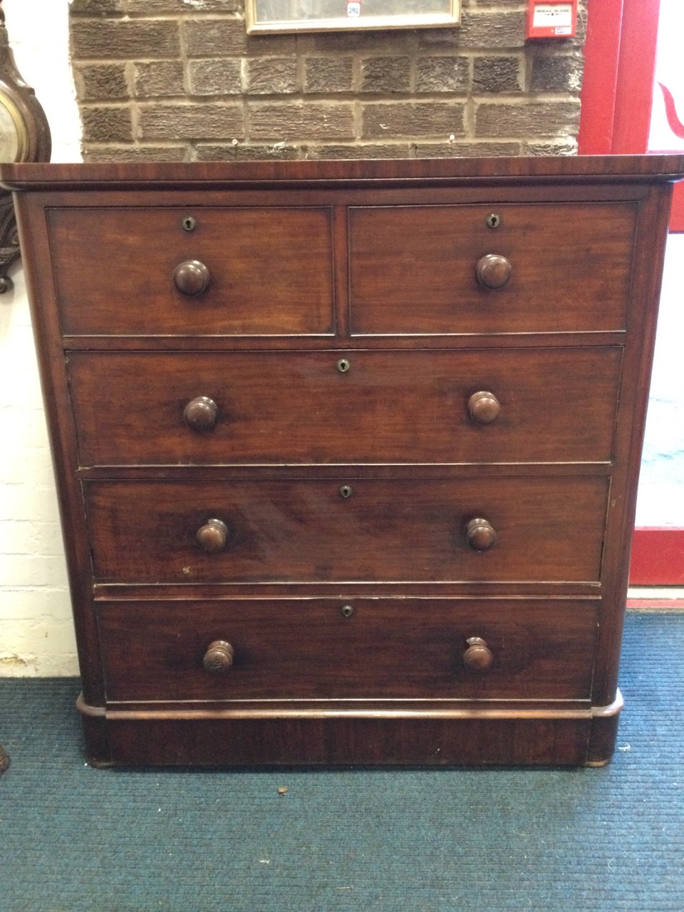 A Victorian mahogany chest of drawers, the rectangular rounded top above two short and three long - Image 2 of 3