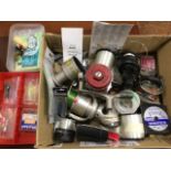 A box of miscellaneous fishing tackle - an Intrepid Sea Streak multiplier reel, weights, two other