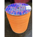 An unused drum of rope, the reel with 3100 metres of 5mm polyethylene cable. (15.25in x 19in)