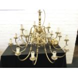 A massive country house Dutch style chandelier, with turned column on chain having ball drop finial,