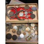 A cigar box containing a quantity of coins, bracelets, brooches, pendants, bangles, etc. (A lot)