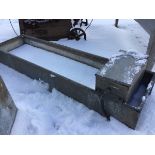 A 6ft rectangular galvanised trough with tubular rim having water cysten to one end. (71.5in)