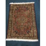 An Anatolian oriental rug having pink field woven with busy floral decoration centering on a