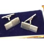 A pair of Georg Jensen 925 sterling silver cufflinks with ribbed rectangular panels hinging on