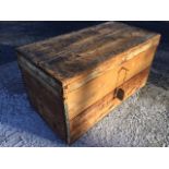 A rectangular nineteenth century pine box with tin lining having metal mounts, complete with key. (