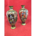 A pair of Edwardian hexagonal cloisonné vases, each decorated with two Egyptian style figural panels