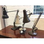 A 60s Herbert Terry anglepoise lamp with sprung arm on square stepped cast iron weighted base; and